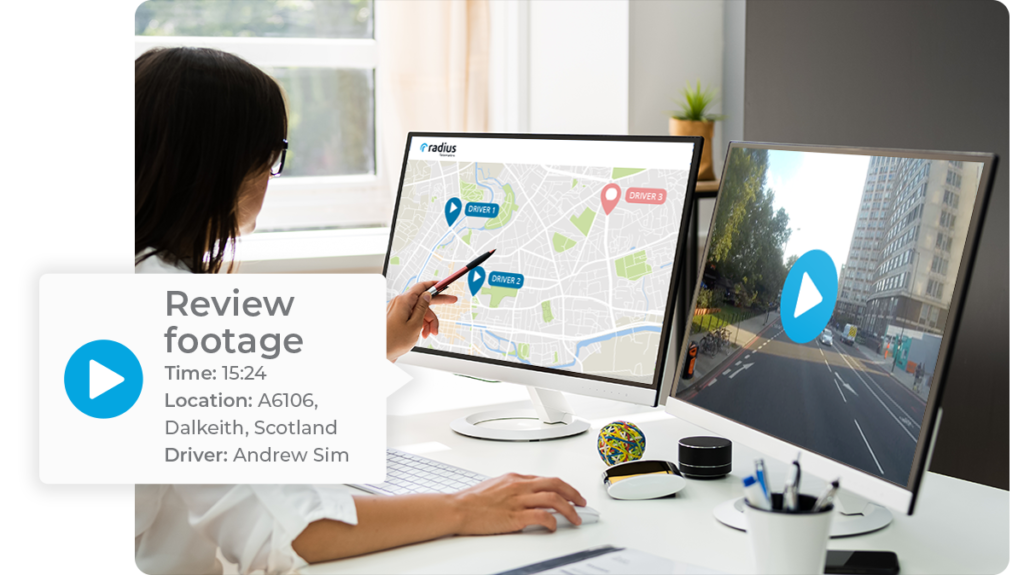 woman_at_desk_reviewing_4g_hd_dash_cam_and_location_data_on_telematics_device