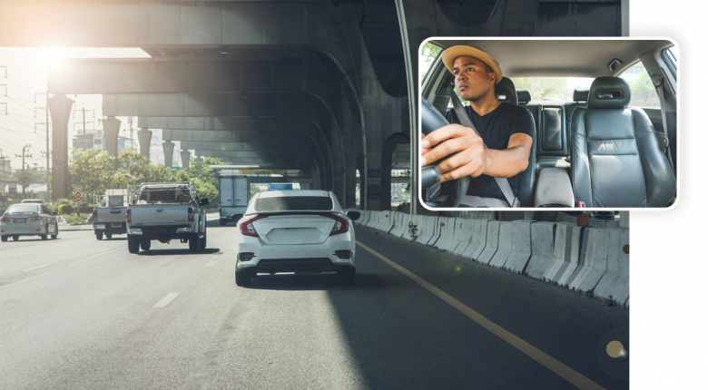 dual_facing_dashcam_showing_busy_road_with_vehicles_and_driver_concentrating